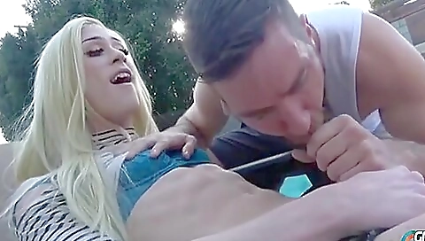 Busty blonde with a tattoo on her back fucked by a guy