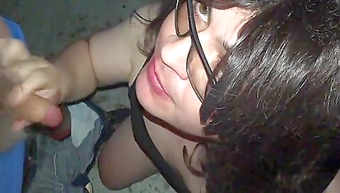 Busty brunette swallows cum from two men in her mouth