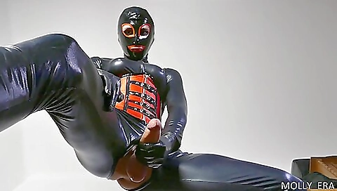 Blonde milf gets her legs covered with latex in the foot fetish video