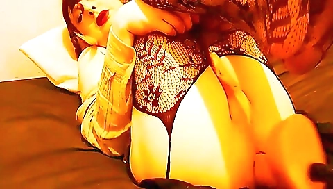 Sexy brunette in stockings enjoys fucking on the fuck machine