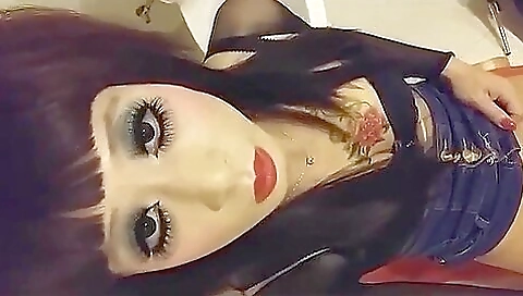 Tattooed brunette enjoys foot fetish and domination